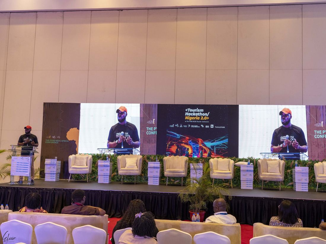Ayoola Gbade-Bello on stage at the 2023 edition of Tourism Hackathon Nigeria, hosted by the Pyne-NESG Africa Conference