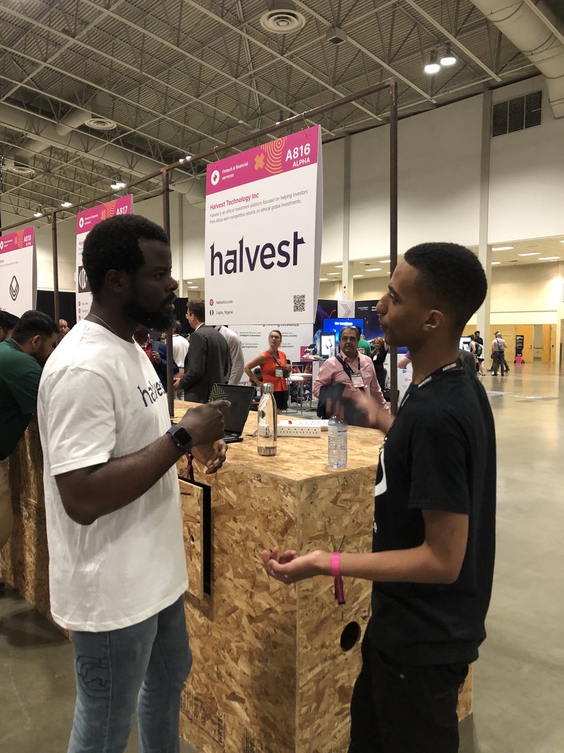 Ayoola Gbade-Bello volunteering at the Halvest booth, Collision (now Web Summit), Toronto, 2024