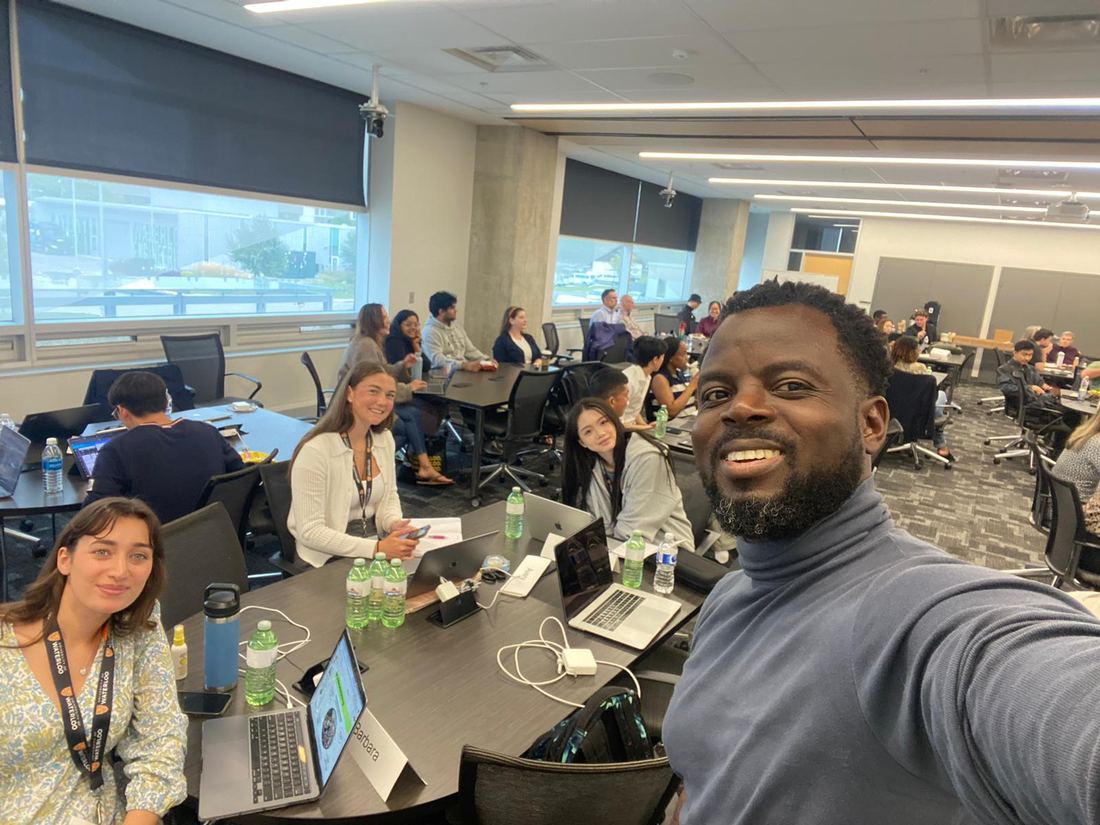 Ayoola Gbade-Bello with coursemates at the Conrad School of Business and Entrepreneurship, University of Waterloo