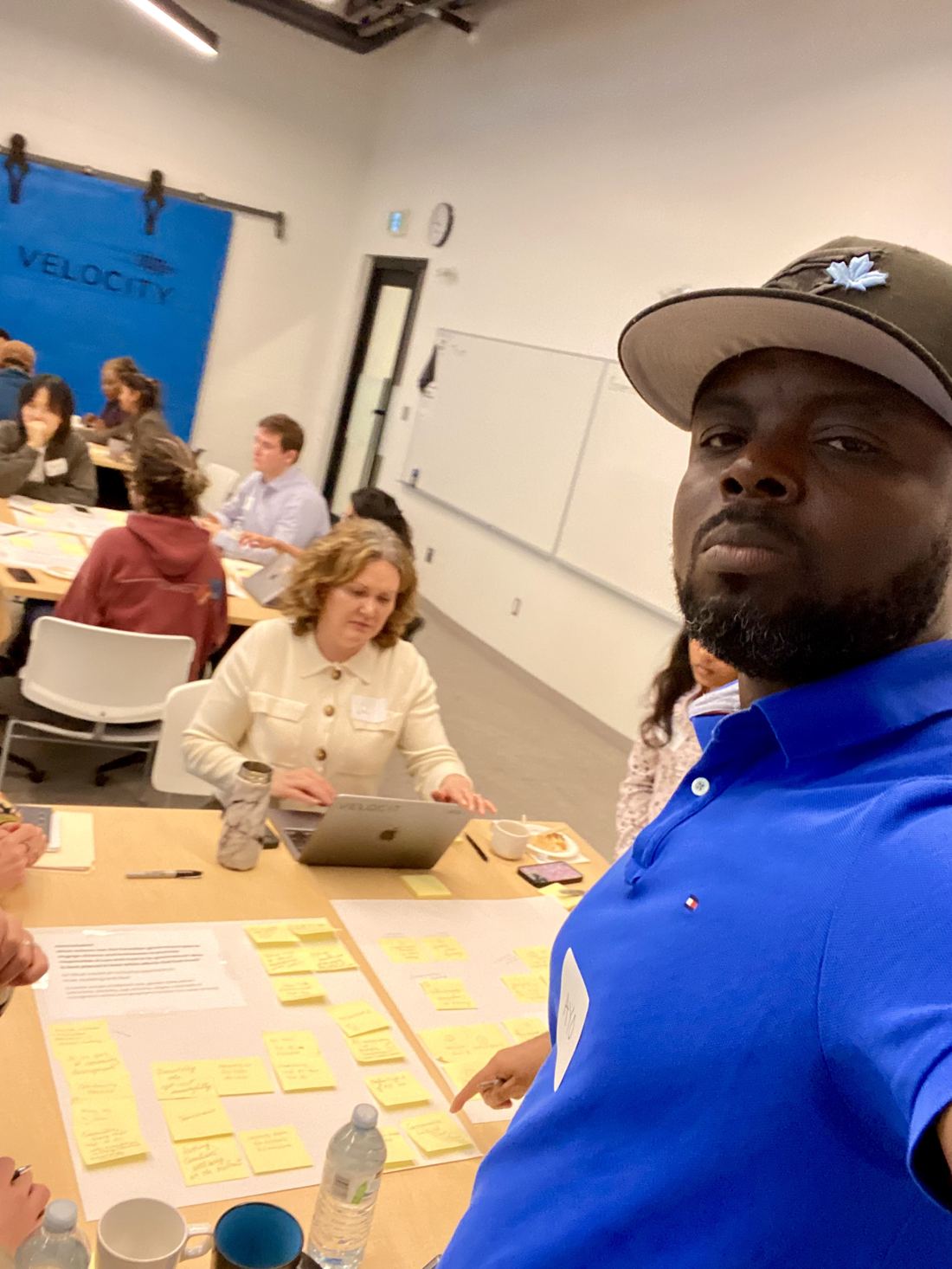 Ayoola Gbade-Bello at a taskforce brainstorming session for Canada's AI Strategy, Velocity, 2025